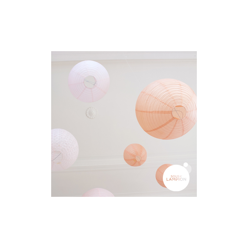Peach and pink paper lanterns decorations set for a wedding