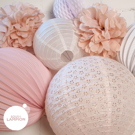 Lampions et boules papier dans les tons de rose pour décorer un anniversaire ou une chambre de petite fille