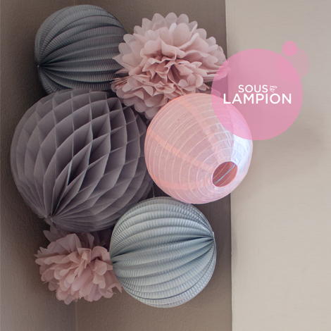 chambre bébé rose et grise: décoration murale avec des lampions