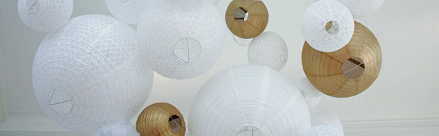 Gold and white paper lanterns ceiling