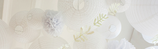 Paper lanterns and foliage decor