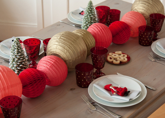 red and gold holiday table centerpiece