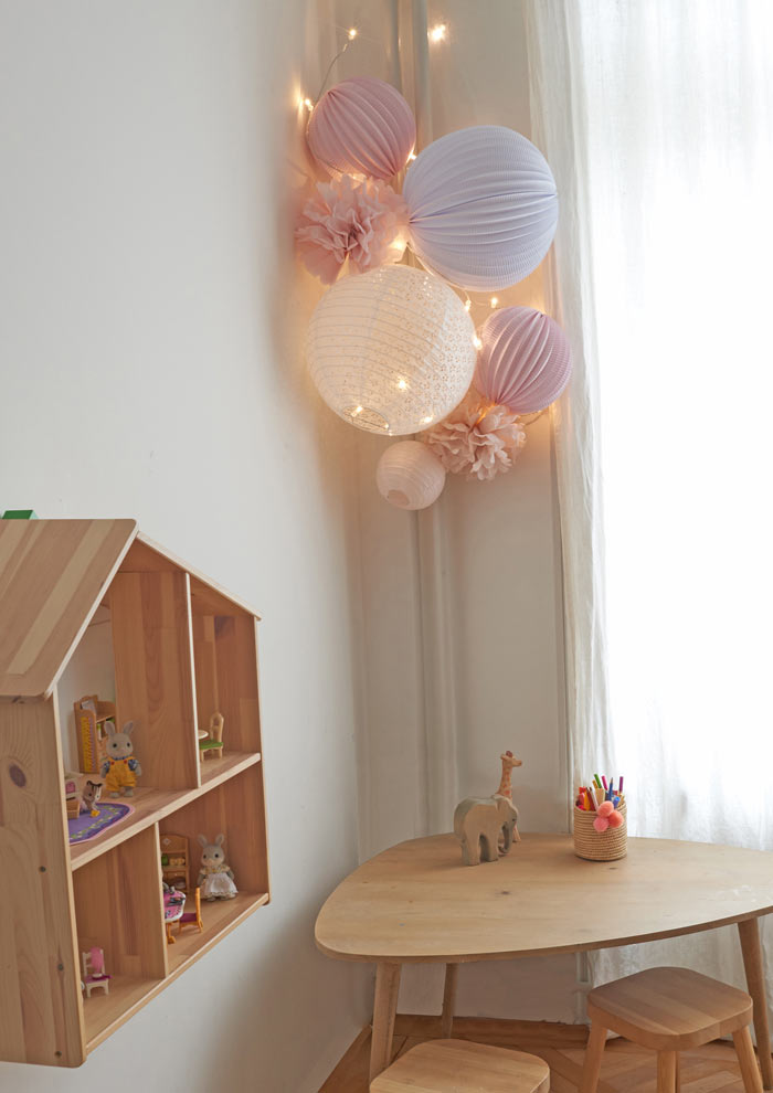 pink and white wall decor for nursery with Under The Paper Lantern 