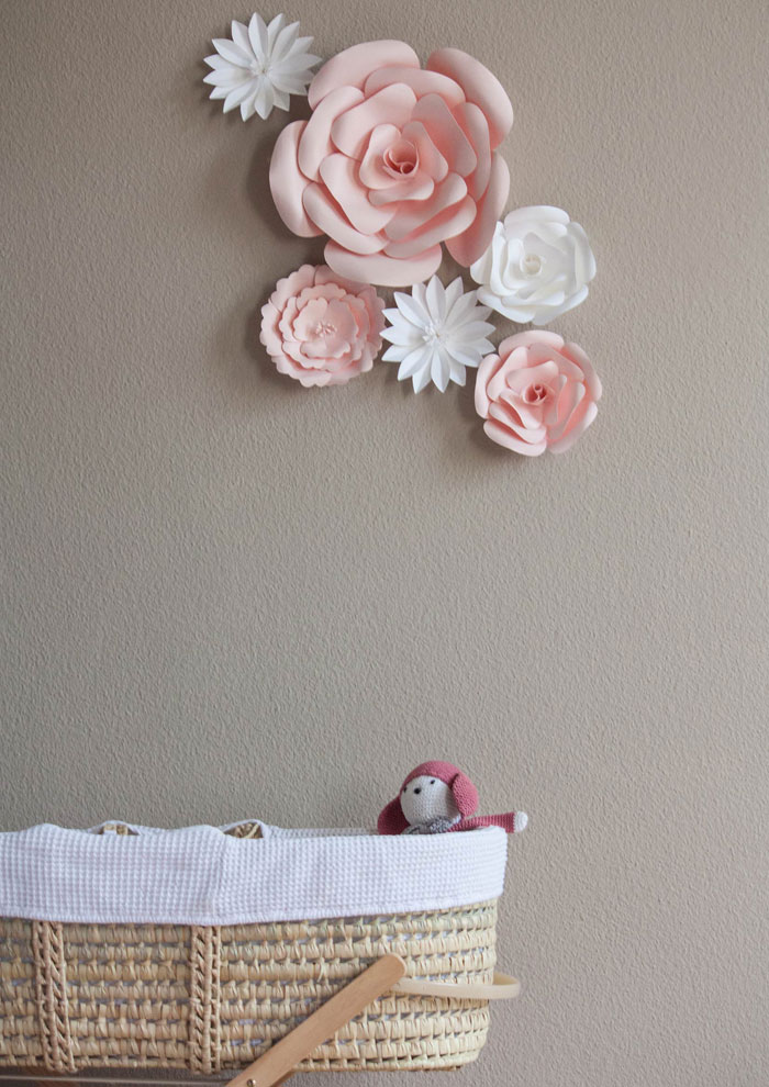 pink and white paper flowers wall decor for nursery | Under The Paper Lantern 